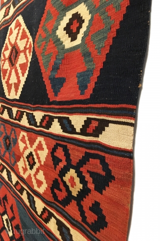 Antique Caucasian Kilim.  2nd Half 19th Century.  Mint condition.  Soft dungaree handle.  Original macrame braided end.  7 colors.  Strong green.  10’9” x 3’0”.  Delicately  ...