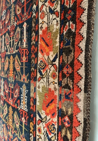 Antique Caucasian Karabagh Runner. SE Caucasus. Last Quarter 19th Century. Three rows of tree shrub forms surrounded by striking angled botehs on deep blue field. Beautiful repeating colorful blossomed flower border. 8  ...