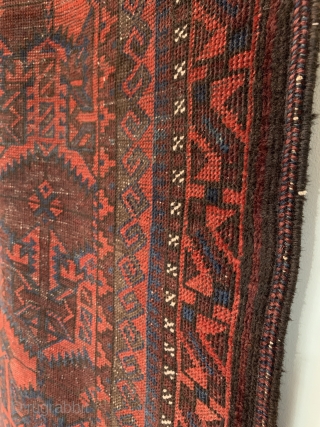 Antique Baluch Chakhansur Long Rug. Late 19th Century. Afghanistan. Rows of madder and undyed dark brown wool 'ashik' tree devices radiate a diagonal pattern. Dragon type totems are entwined. Excellent condition considering  ...