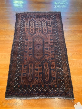 4'9" x 2'7" Baluch Rug [096]

Antique Baluch rug. Powerful birds head medallions with an S-border, and a rich red turning to a copper. Kilim ends, with a two cord selvedge, six colors,  ...