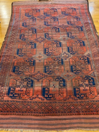 10'1" x 6'8" Ersari Main Carpet [077]

An antique Ersari Main carpet. This piece features a 3x6 gol pattern floating on a madder brown field, with original wide kilim ends. Alongside seven bright  ...