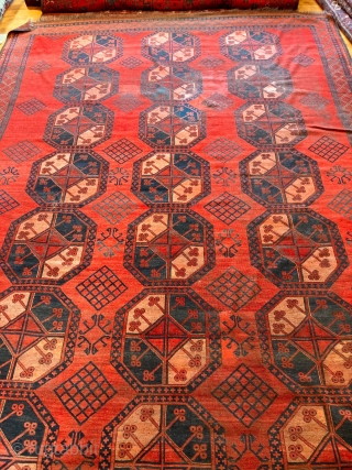 13' x 9'3" Ersari Main Carpet [080]

An antique Ersari large main carpet. Blue and orange gols on a cherry red field  with a grid diamond secondary gol. Great condition for it's  ...