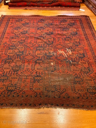 8'8" x 8'4" Ersari Main Carpet [SH-084]

An antique Ersari main carpet. Maroon and brown on a madder field with blue and orange. Note the almond border found in Ersari pieces. Features 6  ...