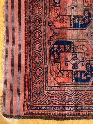 10'1" x 6'8" Ersari Main Carpet [077]

An antique Ersari Main carpet. This piece features a 3x6 gol pattern floating on a madder brown field, with original wide kilim ends. Alongside seven bright  ...