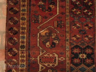 Beshir Ersari Main Carpet, 6'7 x 13'10. Circa 1875. Nearly complete, and scarce so, with Herati and Khotan main borders and the five-medallion Herati field pattern. Very restorable, with the usual scattered  ...