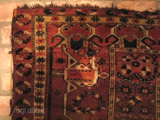 Beshir Ersari Main Carpet, 6'7 x 13'10. Circa 1875. Nearly complete, and scarce so, with Herati and Khotan main borders and the five-medallion Herati field pattern. Very restorable, with the usual scattered  ...