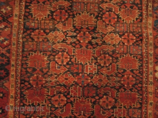 Beshir Ersari Main Carpet, 6'7 x 13'10. Circa 1875. Nearly complete, and scarce so, with Herati and Khotan main borders and the five-medallion Herati field pattern. Very restorable, with the usual scattered  ...