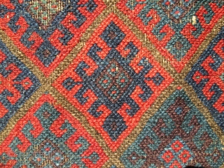 Jaf Kurd Chuval Face, 3'2" x 2'1". Fresh find. This virtuoso weaving is distinguished by the use of ivory solely to frame the field with a diamond-studded crown. Successive rows of knots  ...