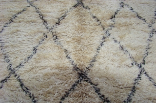 Hand-loomed in soft organic wool in the 1960s, has a simple harlequin pattern and its tribal graphics pair well with contemporary or traditional design. It is inviting, chic and plush with a  ...