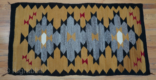 Gorgeous Antique Navajo hand woven wool rug, it measures 2'5" x 4'6" ft. great condition, colors are gold, gray, black, red, white, professionally hand washed recently.