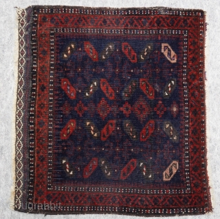 Antique Baluch Saddle bag face, ca.1870s, size is (1'9" x 1'8" ft) (53 x 52 cm.) tightly woven.               