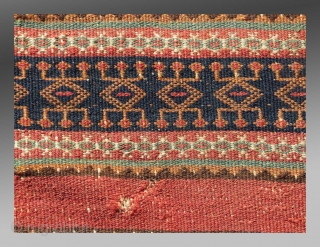 Baluch Kilim (fragment), SW Pakistan/SE Persia, 19th C., approx 1'7" x 3'1"

An older fragment exhibiting designs and colors not often seen in these flat weaves. 

See detail image for 'damage' in the  ...