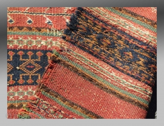 Baluch Kilim (fragment), SW Pakistan/SE Persia, 19th C., approx 1'7" x 3'1"

An older fragment exhibiting designs and colors not often seen in these flat weaves. 

See detail image for 'damage' in the  ...