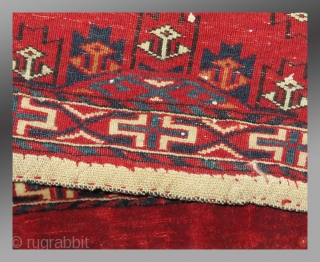Yomut Group Torba, Central Asia, circa 1900 or before(?), 2'11" x 1'4"

Asymmetric knot open right

Cotton weft (white with some blue)

Good condition, no repair, complete with hanging cords and flat woven back

Saturated clear  ...