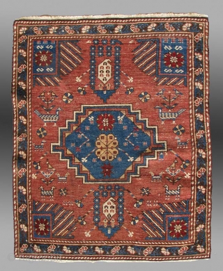 Shirvan Rug, Caucasus Mtns., late 19th century, approx 2'9" x 3'8"

A cute little rug from the Shirvan area.  The small size and different arrangements of ornaments suggests this may have been  ...