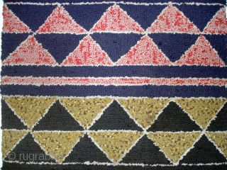 American Hooked Rug
With a few minor areas of distress,this is an interesting geometric composition. Distress includes wear on the upper right corner and a few pile loops that have come loose. Circa  ...