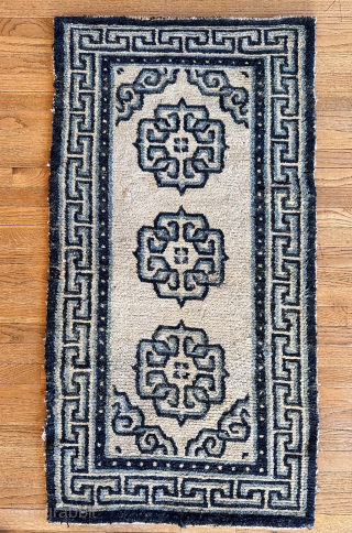 Nicely drawn Ivory grounded sleeping carpet. 
Indigo with undyed wool.
circa 1900
Tibet.

please contact me directly   tmond@hotmail.com                