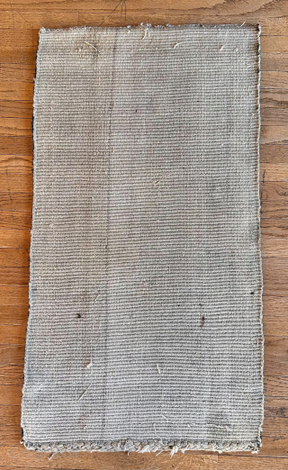 Here is an excellent example of a wang den, warp-faced back saddle carpet. This piece features a stunning green ground with two medallions and a single Tigma motif at the center. The  ...