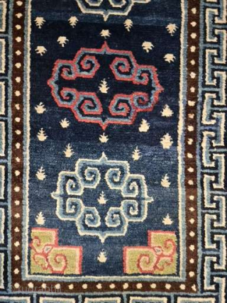 Here is a stunning small Khaden with an unusual corner fret treatment. With beautifully dispersed 'frog feet', and dynamic abrash this khaden features three rams horn medallions. The center medallion is drawn ...