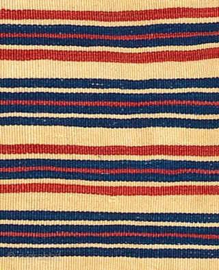 Woman's Shawl, 
Berber, Middle Atlas, Morocco,
Wool,
19th/early 20th Century,

78x32 in/198x81 cm,


Very finely spun thread produced a textile with an exceptional "hand"; red and blue banding on a natural white ground creates a tour  ...