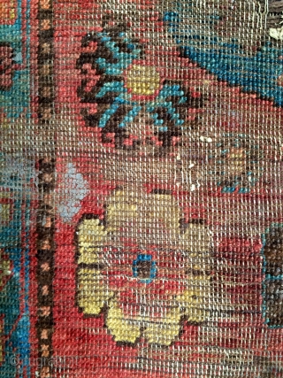 pretty much fragmented rug from the khotan oasis, early 19th century, 193 x 99cm, 6'4" x 3'3", came out of tibet, as found condition and in need of water    