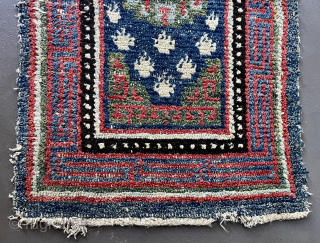 A typical "Wangden Drumze" upper saddle rug (Masho). South central Tibet, Wangden region. 19th century, 97 x 63 cm. As found. 

For more information see Publication: Drumze, Methamorphoses of the Tibetan Carpet,  ...