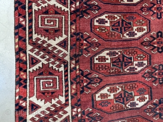 A Kyzil Ayak main carpet with a large border.  Loges dates the carpet to about 1850. The condition is good, it still has a pile except for a lower area in  ...