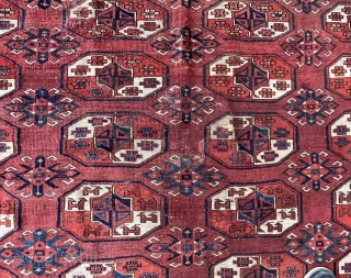 A Kyzil Ayak main carpet with a large border.  Loges dates the carpet to about 1850. The condition is good, it still has a pile except for a lower area in  ...