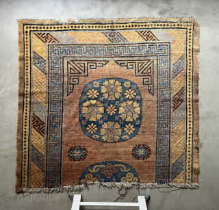 This fragment of a Khotan carpet actually shows half of a carpet and features a magnificent, beautifully drawn medallion. The carpet is in good condition, with an original ending and no restorations.  ...