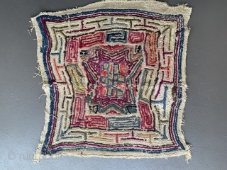 Extremely unusual and funky embroidery from Tibet. Could have been used in some way as a meditation mat or related religious rituals?  Endless  knot as the main motif, surrounded by  ...