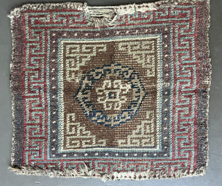 A really old Khamdrum or Gamdrum rug from Tsang/Central Tibet. It is no longer possible to tell whether it is a single piece or once part of a temple runner. Published in  ...