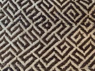 An unusual embroidery of yak wool with an allover pattern reminiscent of a labyrinth. Four panels have been sewn together as a basic fabric, which ties in with the Tsuktruk tradition. Maybe  ...