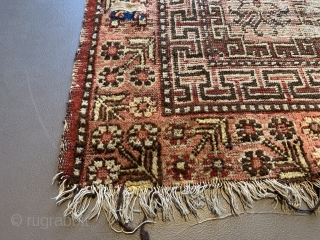 Pretty battered Khotan rug. First half 19th century, 220 x 112 cm                     