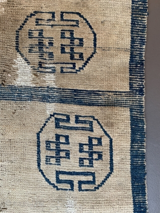 Door rug from Tibet. With some old repairs and holes.  Basically in a weak condition as you can see from the pictures. But it is the rare and early type of  ...