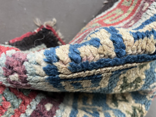 
A central Tibetan Khamdrum-style seating rug 66 x 71 cm. The partially visible border of red fabric is evidence of its use as a seating rug. There is a colour that could  ...