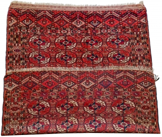 Antique Turkmen Tekke Early 20th century Has 8 Tekke guls with secondary chemche guls. Complex border with various elements including the tree design in the end panels, among other things.

In good condition  ...