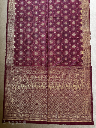 Ceremonial shawl, Palembang, Sumatra. Ornate brocaded cloth, weft ikat field, bamboo shoot pattern. Silk and gold metal thread, size 202x84cm, circa 1900. www.tinatabone.com