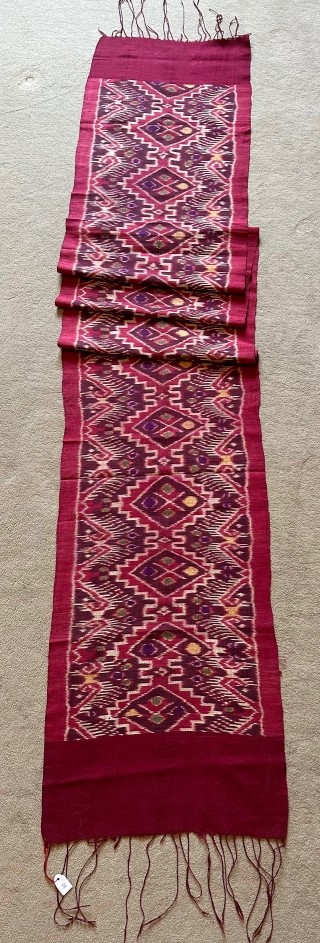 Ikat woven (endek) Breast-cloth from Bali, Indonesia. Early 20th century.Size: 242x38cm. vibrant colours, excellent condition. Colourful woven ikat cloths typically worn in Bali for ceremonial occasions.Item no:80. please visit: www.tinatabone.com   