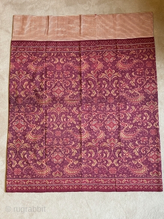 Fine sarong with stylised naga. Bangka, Sumatra, Indonesia. Silk weft-resist dyed, gold metal threads, cotton. Size:104 x 88cm. Around 1900. Item: BLS68. www.tinatabone.com          