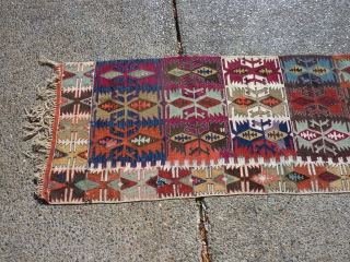 Anatolian kilim-half  which someone cut in half (probably for display purposes--could be rejoined fairly easily).  Some of the dies are "hot" transitional colors, but still a piece with great workmanship  ...