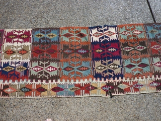 Anatolian kilim-half  which someone cut in half (probably for display purposes--could be rejoined fairly easily).  Some of the dies are "hot" transitional colors, but still a piece with great workmanship  ...