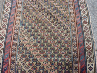 8'3" x 4'   Antique Kurdish runner with low pile and a couple of crude repairs.                