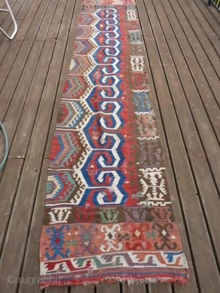 Early part of 19th C Kona Kilim half.  13' 6" x 34"  many old repairs but fairly complete. SOLD THANK YOU!          