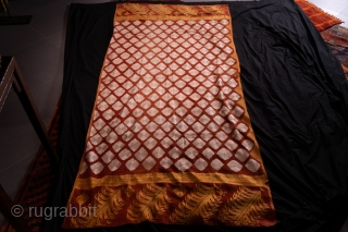 Extremely well aligned Chand Bagh Phulkari from West Punjab (Pakistan) 260x166cm , end of 19th century, white silk floss with golden ends and selvedge embroidery on contrasting red handspun cotton   