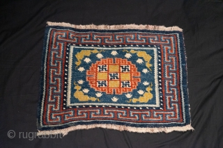 Tibetan Khagangma Meditation Rug - Tibet, 19th c, blue field with medallion and  "frog foot" motif.  70x54 cm             