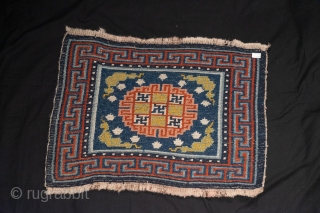 Tibetan Khagangma Meditation Rug - Tibet, 19th c, blue field with medallion and  "frog foot" motif.  70x54 cm             