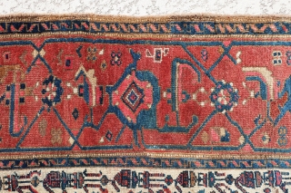 Very interesting, antique Persian Malayer? rug most probably from last quarter of 19th century. It has ivory field color with a very large border. There are some small repiiling areas at the  ...