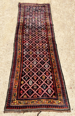 Extremely gorgeous, antique, full pile Qashqai [This looks more like a Bakhtiari] runner with outstanding color combinations. There are many different colors including aubergine. I offer this lovely piece at outstanding price.
 