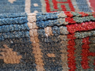 A stunning Khamdrum from mid 19th century or earlier. Both wool and dyes are sensational. 95x57 cm.

One of the best tibetan rugs I've had the pleasure to handle. Sourced in Tibet in  ...