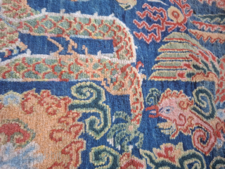 Tibetan Khagangma with a dragon and bird Phoenix. Probably 1930's.  Wool on cotton. 
Dense weave and superp wool and colors.
A little gem.
Just back from professional cleaning. 
One side needs attention 
65x59  ...